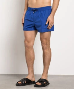 Dolce & Gabbana Blue Swim Shorts With Textured DG Logo -Summer Fashion Clothing 08048632 79c5 4239 b13d d4ad80c94d3e