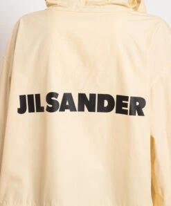Jil Sander Yellow Raincoat With Contrasting Logo Print -Summer Fashion Clothing 391d2bd4 cc60 4ca6 a3c3 e57dd8f39c80