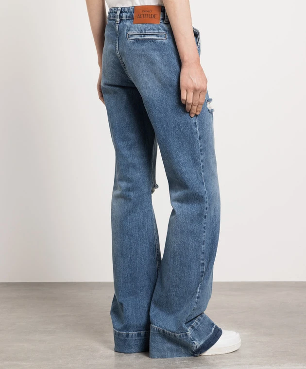 Blue Flared Jeans With A Distressed Effect 4 Blue Flared Jeans With A Distressed Effect - Image 4